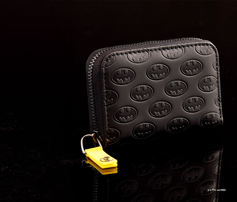 Black product background featuring Loungefly DC Comics COLLECTIV Batman&trade; 85th Anniversary The ORGANIZR Accordion Zip Around Wallet
